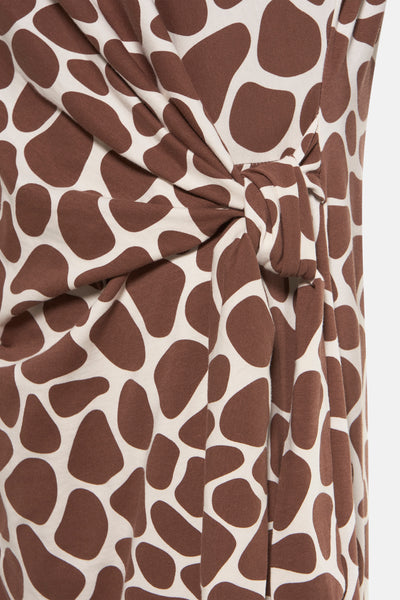 Bruine Terra di Siena met gespikkelde print en knoop aan de zijkant.