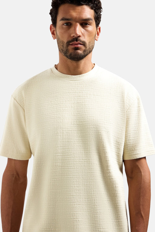 Ecru T-shirt met korte mouwen van No Excess, met een geweven textuur.