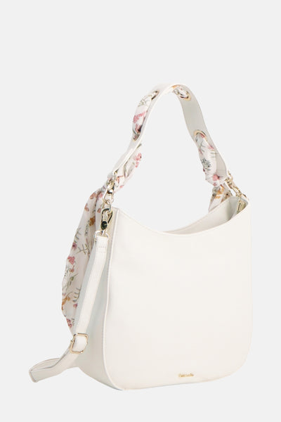 Sac à bandoulière blanc de Tamaris, avec bandoulière à motif floral et matériel doré.