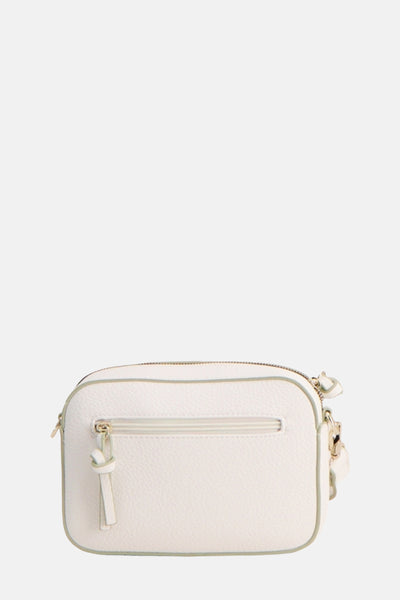 Sac à bandoulière blanc de TAMARIS avec fermeture éclair, bandoulière et finitions ton sur ton.
