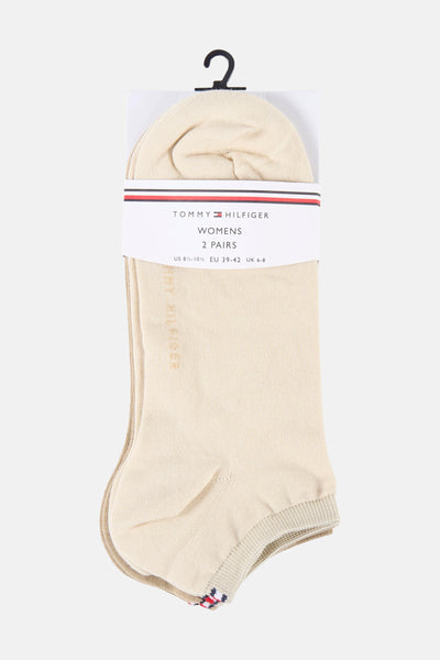 Chaussettes beiges de TOMMY JEANS, deux paires avec une bande rayée rouge, blanche et bleue au bout.