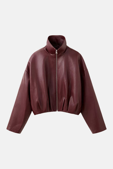 Bordeaux leather bomber jacket with high collar and front zipper, cropped fit, smooth texture, front view