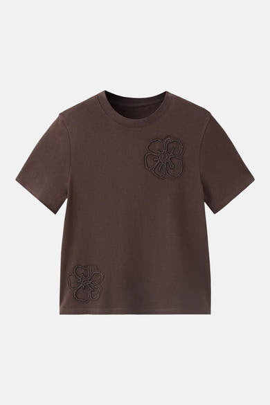 Brown short-sleeve t-shirt with floral beaded appliqués on chest and hem, front view