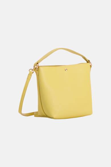 Yellow leather handbag with top handle and detachable strap, featuring gold-tone hardware and a minimalist front design.
