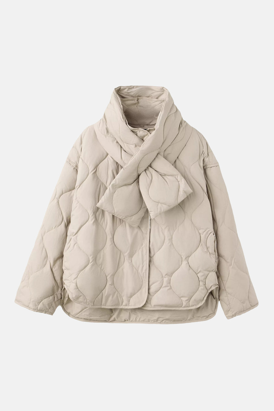 Beige quilted puffer jacket with bow collar and wavy stitching, front view