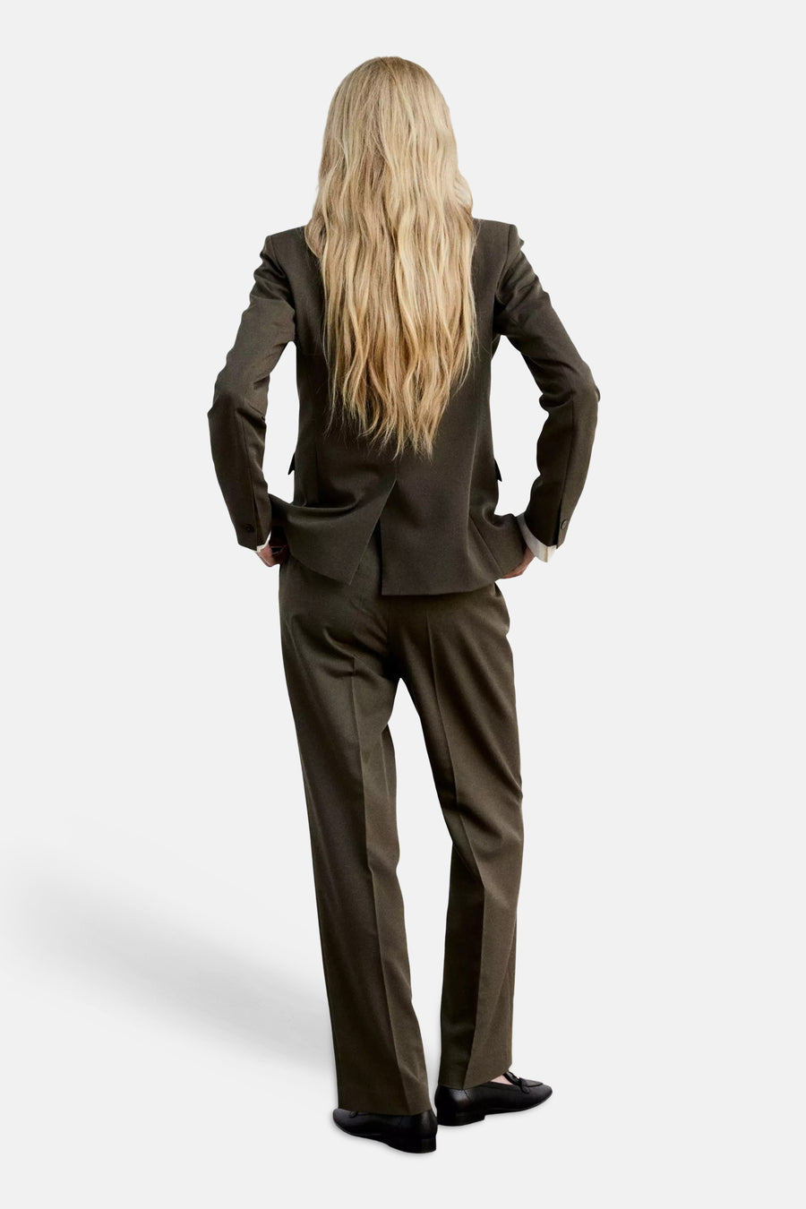 Khaki suit pants with straight-leg cut, shown from back view on model wearing matching blazer and black loafers