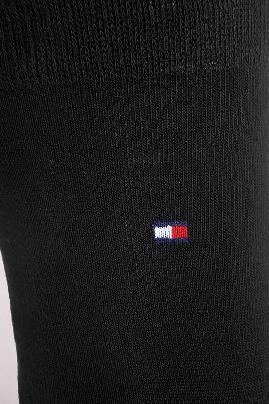 Chaussette noire de TOMMY JEANS avec logo rectangulaire bleu, blanc et rouge brodé.