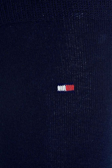 Chaussettes bleues de Tommy Jeans avec motif brodé discret.