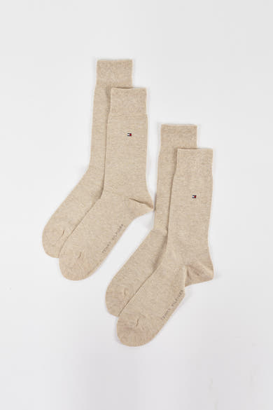 Chaussettes beiges de TOMMY JEANS, deux paires en coton mélangé avec le logo de la marque sur le côté.