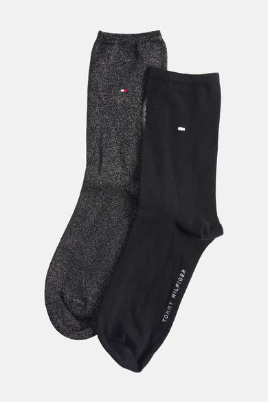 Chaussettes noires et brillantes de Tommy Jeans, avec logo discret et finitions scintillantes.