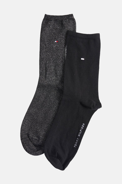 Chaussettes noires et brillantes de Tommy Jeans, avec logo discret et finitions scintillantes.