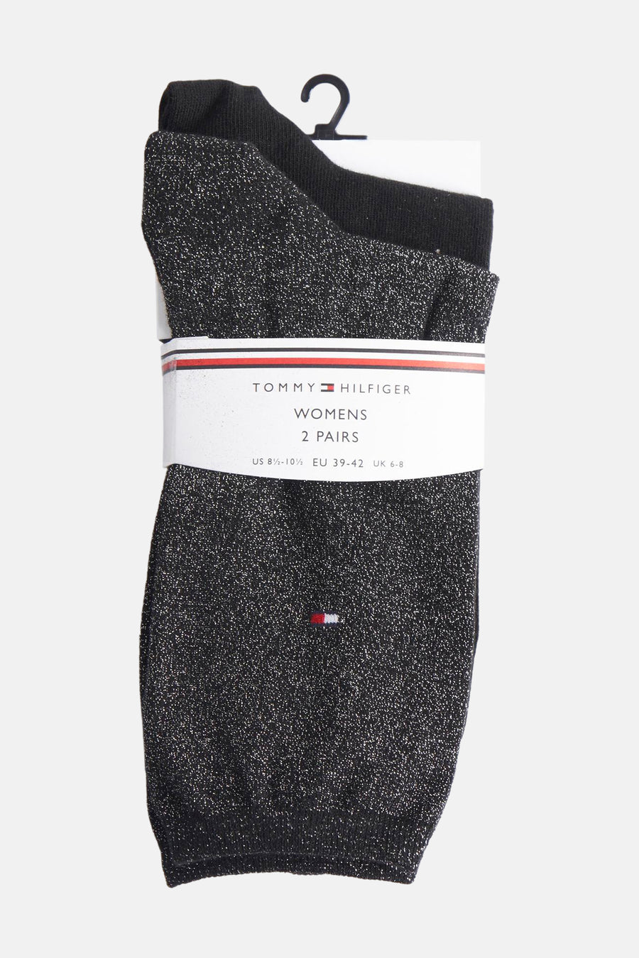 Chaussettes noires brillantes de Tommy Hilfiger, pack de deux, présentées sur une étiquette.