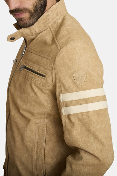 Beige blazer van DELAHAYE met ritssluiting, zakken met rits en witte strepen op de mouw.