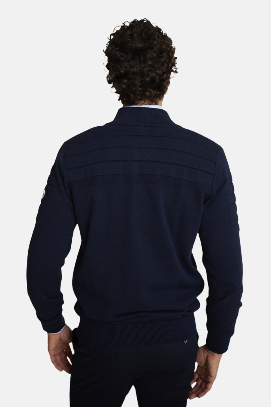Blauwe DELAHAYE bodywarmer met textuurdetails, lange mouwen en ritssluiting, achterzijde.
