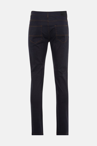 Rechte donkerblauwe denim jeans van DELAHAYE, met oranje contraststiksels, van achteren zichtbaar.