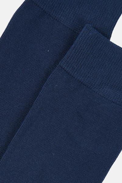 Navy blue ribbed socks with textured knit, close-up side view showing elastic cuff and soft fabric detail