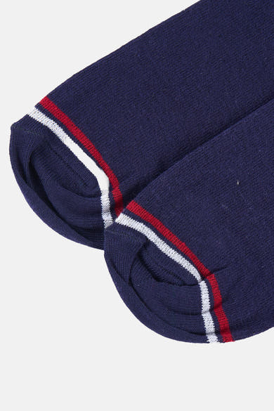 Chaussettes bleues par DELAHAYE avec rayures décoratives blanches et rouges sur le bord supérieur.