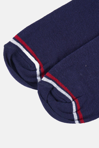 Chaussettes bleues par DELAHAYE avec rayures décoratives blanches et rouges sur le bord supérieur.