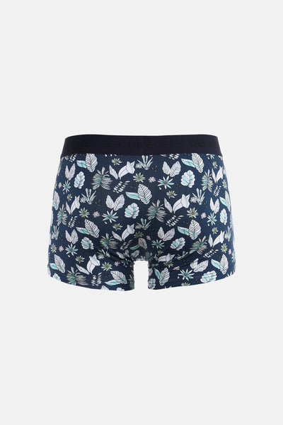 Boxer bleu de DELAHAYE, imprimé de motifs de feuilles et de plantes blanches et turquoise.