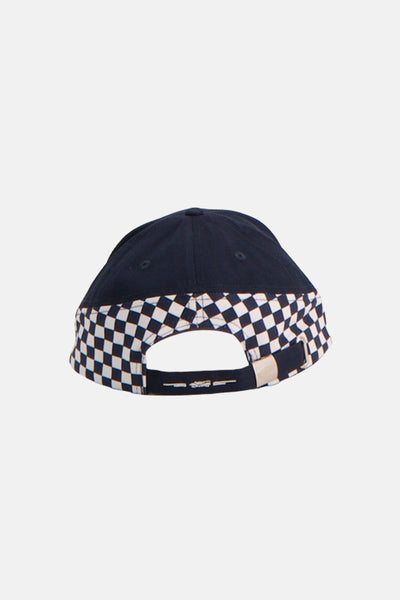 Navy blue baseball cap with white and navy checkered brim, back view, adjustable strap with metal buckle