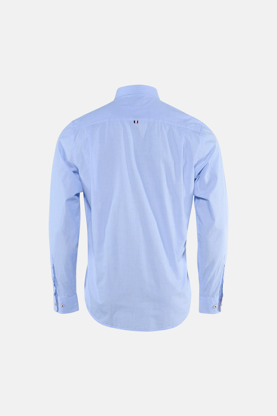 Light blue long-sleeve shirt back view with fine texture and small flag logo at collar, buttoned cuffs, clean tailored fit