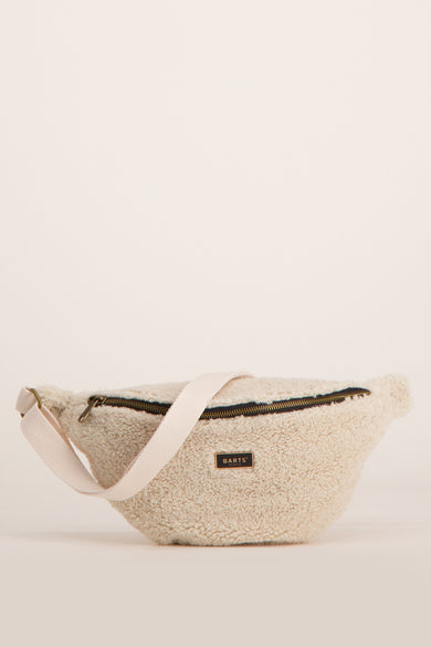 Sac à bandoulière écru en fausse fourrure de BARTS, avec une bandoulière réglable en toile écrue.
