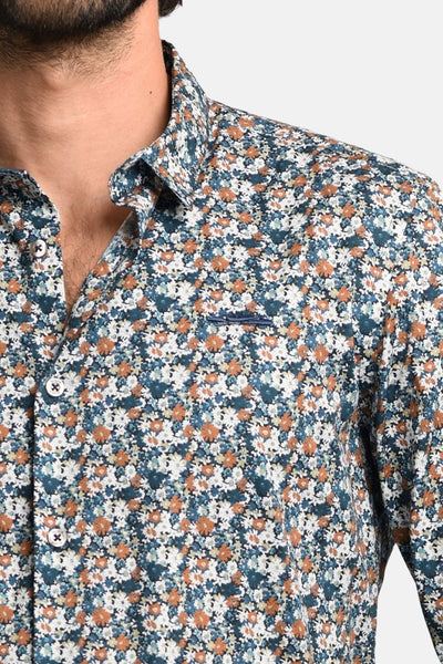 Chemise à manches courtes fleurie by DELAHAYE avec motif floral coloré et patte de boutonnage blanche.