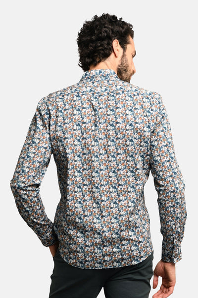 Bloemenprint overhemd met lange mouwen, van DELAHAYE, van achteren gezien, gedragen met een effen donkere broek.
