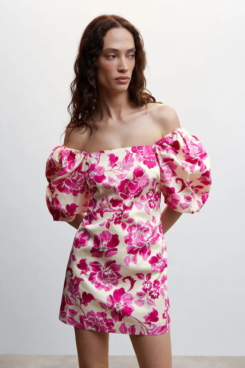 Rose floral midi robe with off-the-shoulder puff sleeves, front view, cream base with vibrant pink blossoms and green stems.