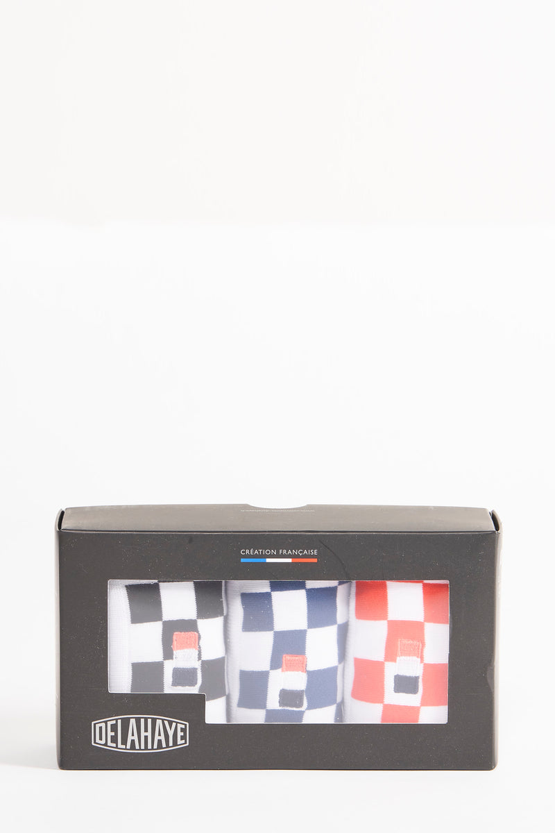 Set geruite sokken, wit, blauw en rood, van Delahaye, in een zwarte doos.