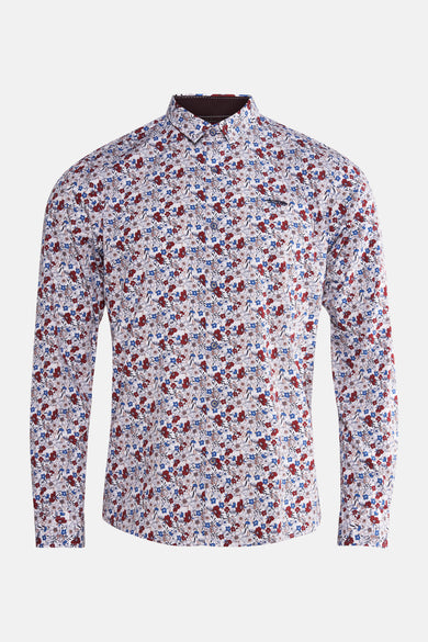 Chemise multicolore de DELAHAYE avec motif floral rouge et bleu sur fond blanc.