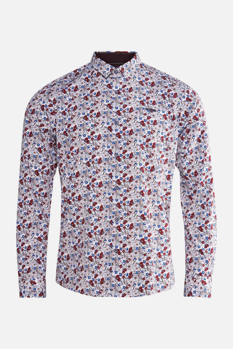 Chemise multicolore de DELAHAYE avec motif floral rouge et bleu sur fond blanc.