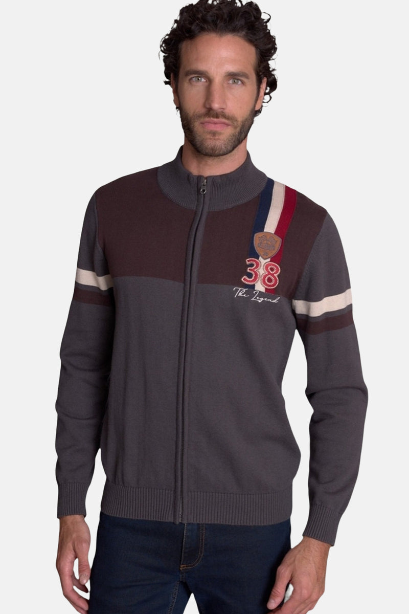 Brown and gray zip-front gilet with striped sleeves, embroidered "38 The Legend" patch, ribbed collar and cuffs, front view