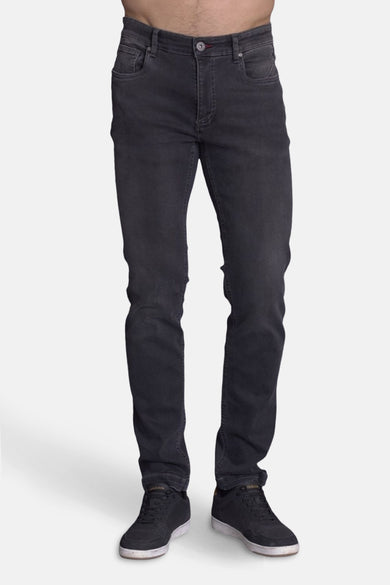 Jean slim en denim gris foncé de DELAHAYE, avec une coupe moderne et des détails subtils.