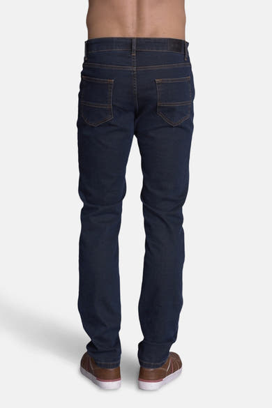 Slim jeans in medium blue denim van DELAHAYE, met klassieke achterzakken en een nauwsluitende pasvorm.