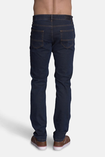 Slim jeans in medium blue denim van DELAHAYE, met klassieke achterzakken en een nauwsluitende pasvorm.