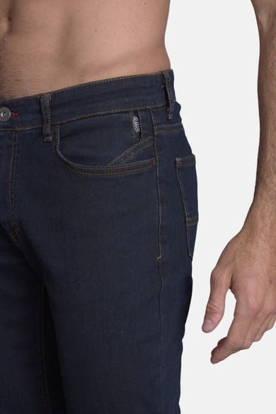 Slim jeans in medium blue denim van Delahaye, met contrasterende stiksels en een nauwsluitende pasvorm.