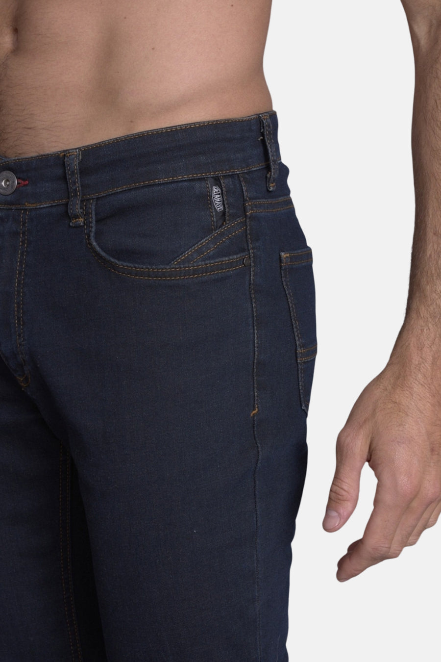 Slim jeans in medium blue denim van Delahaye, met contrasterende stiksels en een nauwsluitende pasvorm.