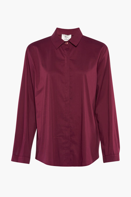 Chemise à manches longues rouge de Terra di Siena, avec col classique et coupe ample.