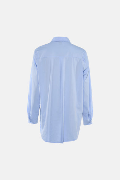 Chemise bleue à manches longues de Terra di Siena, avec pli au dos et coupe ample.