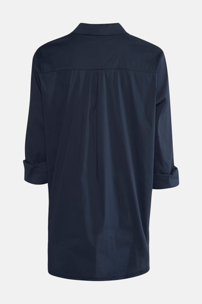 Chemise à manches longues bleue de Terra di Siena, vue de dos avec manches retroussées.
