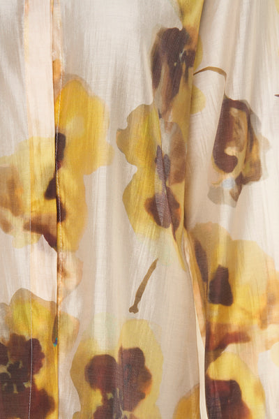 Beige blouse met lange mouwen van Terra di Siena met bloemenprint en zichtbare naaddetails.