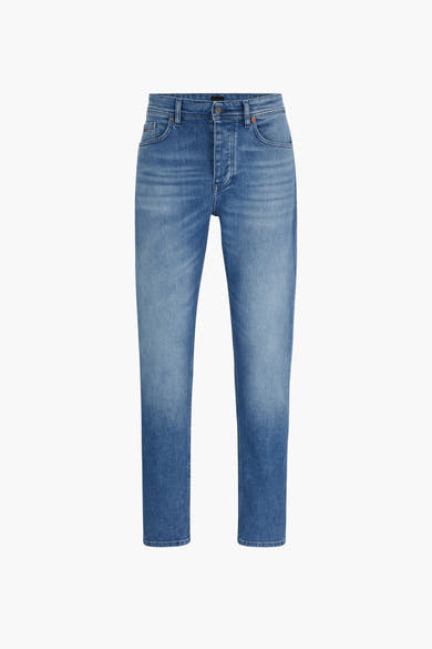Taps toelopende jeans in middinblauw denim van BOSS ORANGE, met oranje stikseldetails.