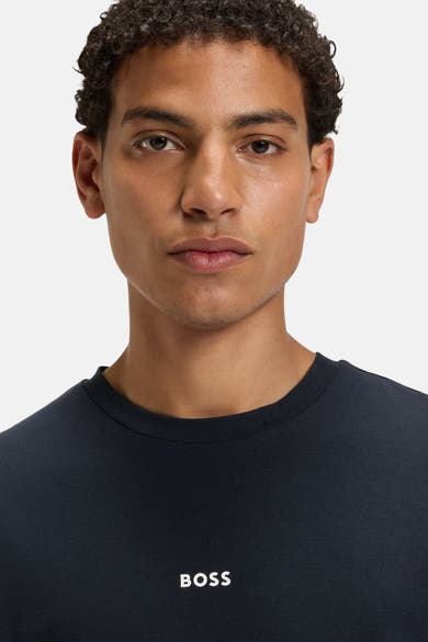 T-shirt bleu à manches courtes de BOSS ORANGE, avec le logo visible sur le devant.