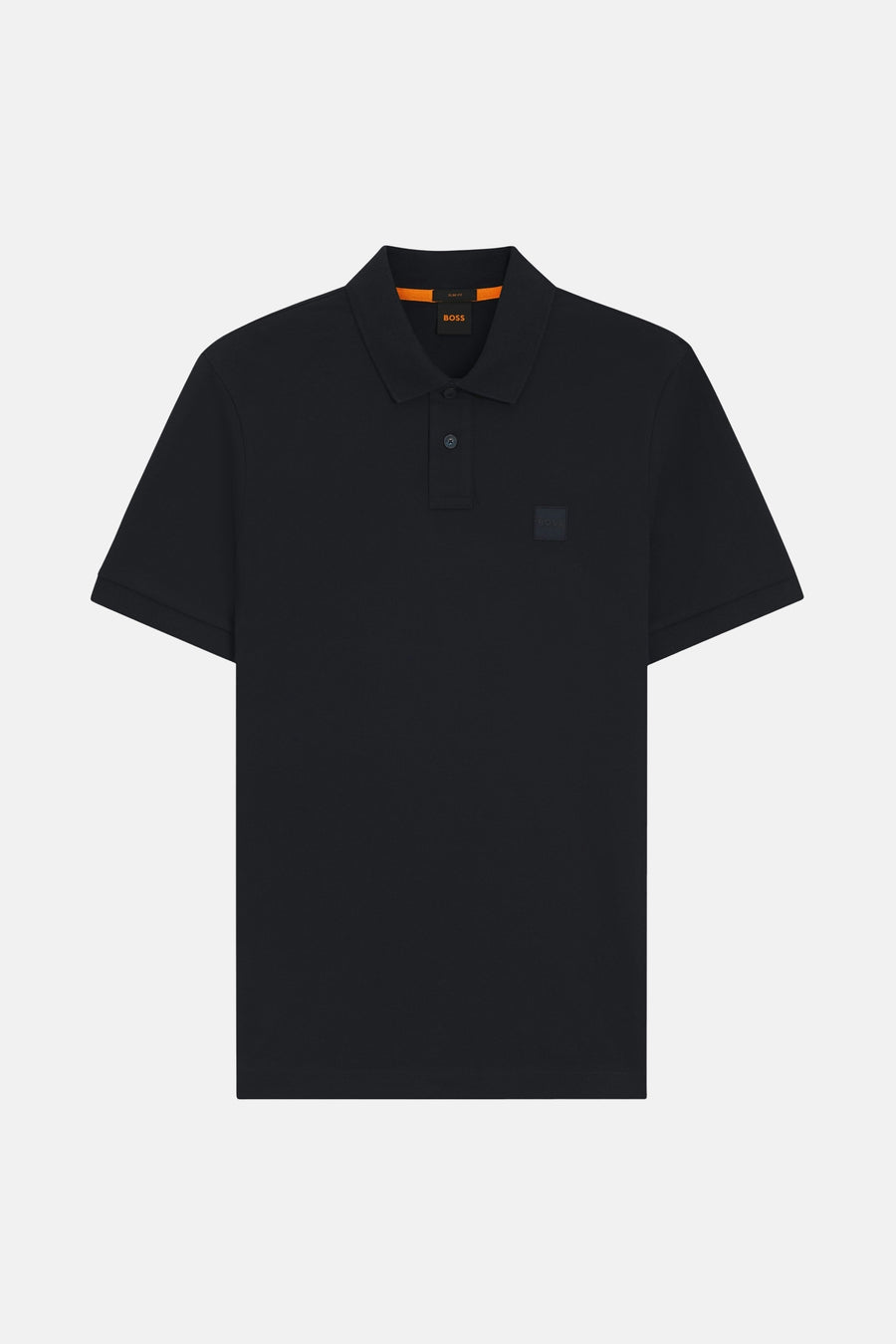 Polo bleu marine à manches courtes de BOSS, avec logo discret sur la poitrine.
