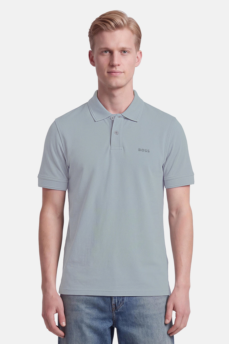 Polo gris à manches courtes de BOSS ORANGE, col classique avec boutons, logo discret sur poitrine, vue frontale sur modèle