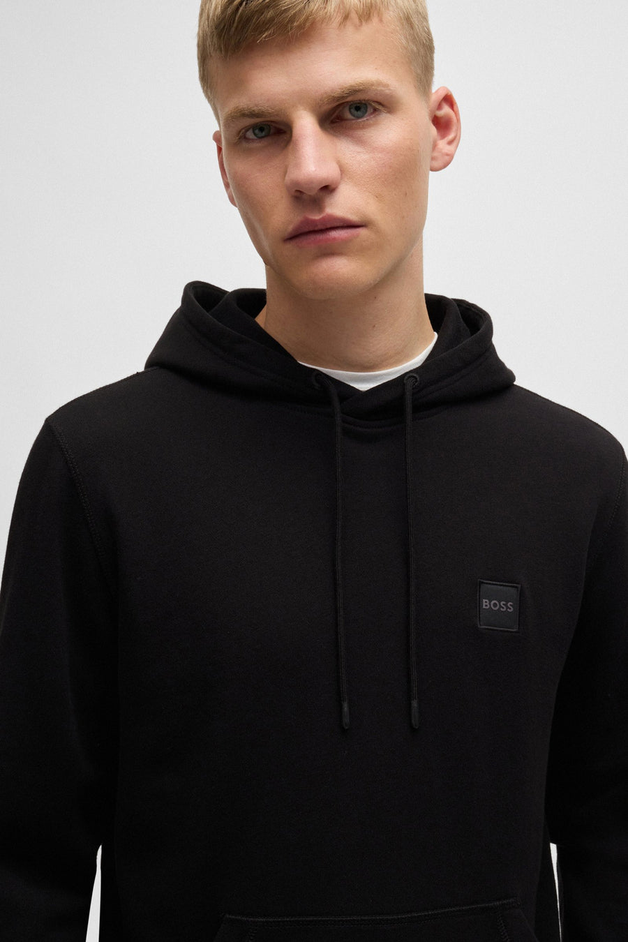 Sweat à capuche noir de BOSS ORANGE, avec cordon et logo ton sur ton sur le devant.