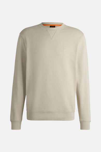 Beige sweatshirt van BOSS ORANGE, met een ronde hals en een klein ton-sur-ton logo.