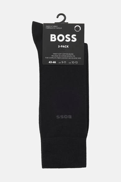 Chaussettes courtes noires par BOSS ORANGE avec logo ton sur ton sur la jambe.