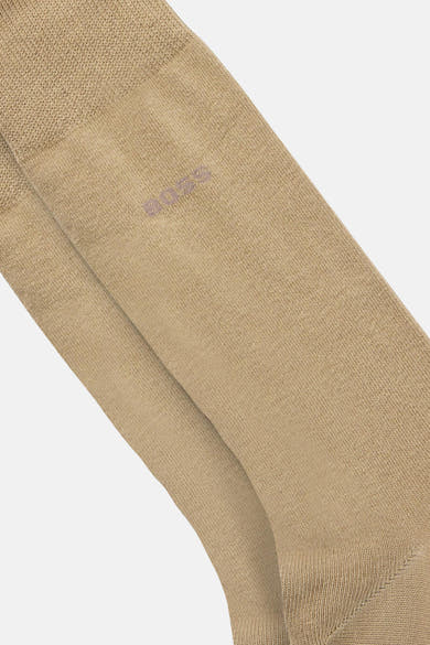 Chaussettes courtes beiges de BOSS ORANGE, avec une texture côtelée fine et logo subtil.
